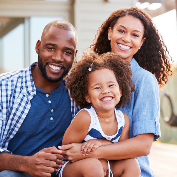 young family smiling
